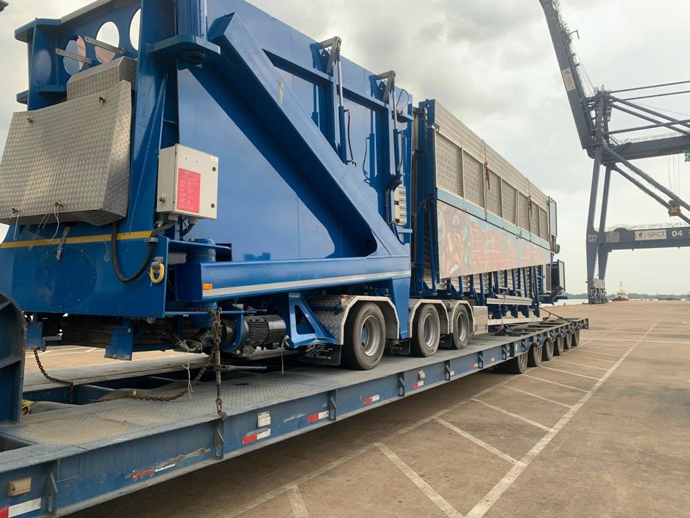 Amusement ride system on multi-axle trailer at Ho Chi Minh City port before Ro-Ro shipment to Melbourne