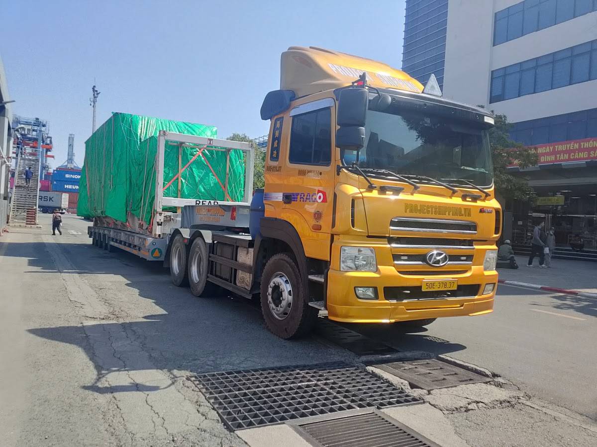 Bảng giá thủ tục hải quan: xe Project Shipping nhận container Flat Rack tại cảng Cát Lái