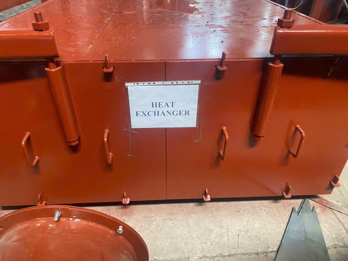 Heat exchanger for an industrial boiler shipped in open top containers to Vietnam