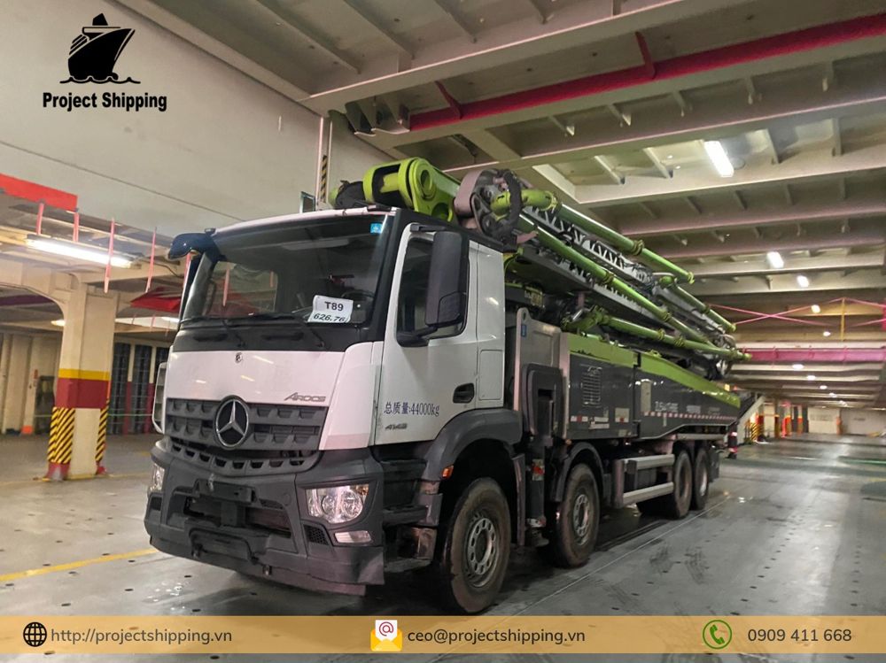 Ro-Ro shipping: concrete pump truck parked and lashed on the deck of a Ro-Ro vessel