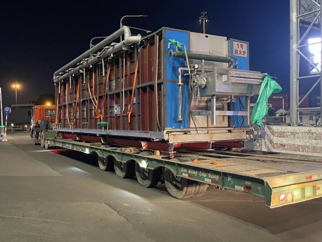 rút ruột container flat rack: lò ủ trên mooc lùn